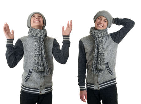 Set of cute teenager boy in gray sweater, hat and scarf with hands up over white isolated background, half bodyの写真素材