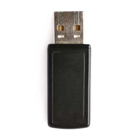 Black flash drive or wireless receiver isolated over white backgroundの写真素材