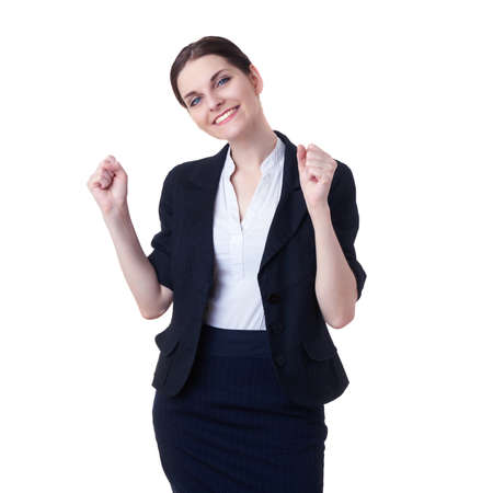 Smiling businesswoman standing over white isolated background celebrating, business, education, office, luck, victory conceptの写真素材