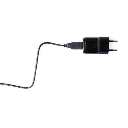 Fragment of the black usb adapter charger isolated over the white backgroundの写真素材