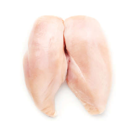Raw chicken fillet breast isolated over white backgroundの写真素材