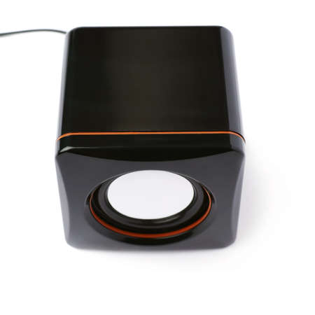 Black glossy sound speaker isolated over the white backgroundの写真素材