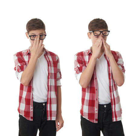Set of cute teenager boy in red checkered shirt and glasses over white isolated background, half bodyの写真素材