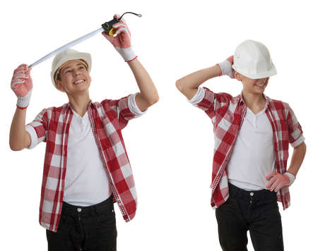 Set of cute teenager boy in red checkered shirt, building helmet and measuring tape over white isolated background, half body, constructing conceptの写真素材