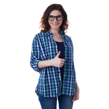 Smiling young woman in casual clothes and glasses over white isolated background showing thumb up sign, happy people conceptの写真素材