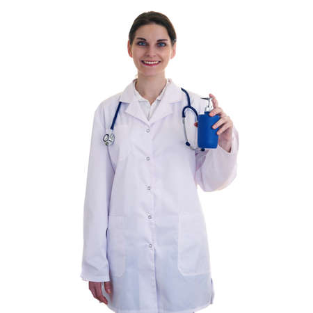 Smiling female doctor in white coat over white isolated background with stethoscope and liquid soap, healthcare, profession and medicine conceptの写真素材