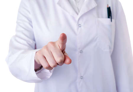 Female doctor assistant scientist in white coat over white isolated background pointing, showing direction or pushing button, healthcare, profession, science and medicine conceptの写真素材