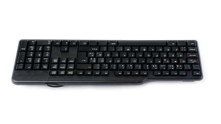 Black computer querty keyboard isolated over white backgroundの写真素材