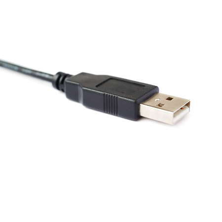 Black USB cable isolated over white backgroundの写真素材