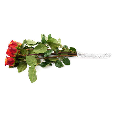 Bouquet of red orange roses over white isolated backgroundの写真素材