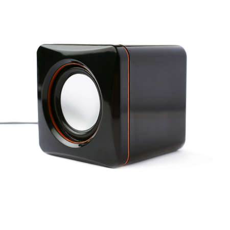 Black glossy sound speaker isolated over the white backgroundの写真素材