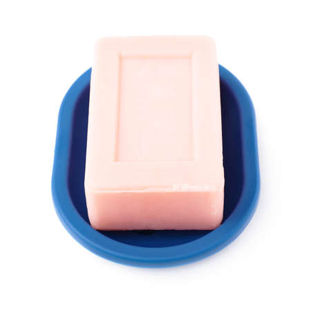 Pink dry soap bar in dish isolated over white backgroundの写真素材