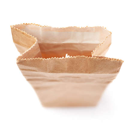 Craft brown paper pack for tea or coffee isolated over white backgroundの写真素材