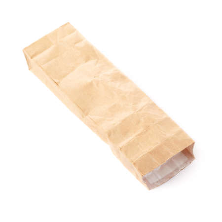 Craft brown paper pack for tea or coffee isolated over white backgroundの写真素材