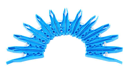 Semicirle shape of blue plastic cloth pegs isolated over white backgroundの写真素材