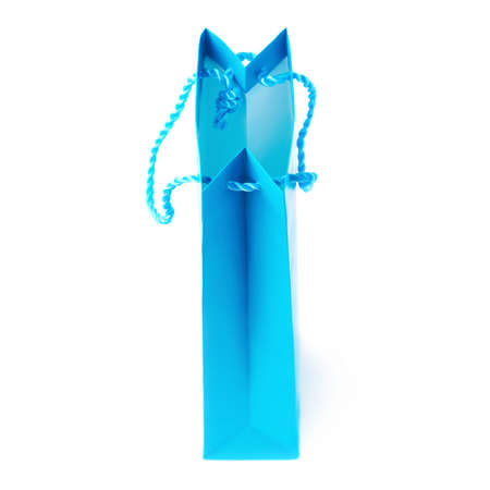 Blue shopping or gift bag isolated over the white backgroundの写真素材