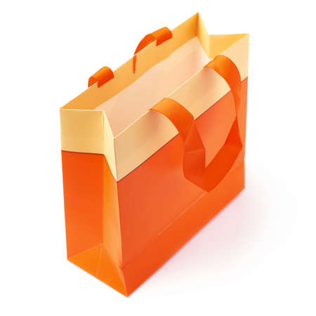 Orange shopping or gift bag isolated over the white backgroundの写真素材