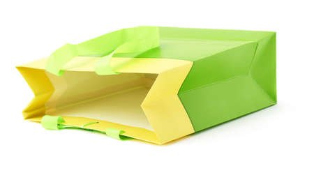 Green shopping or gift bag isolated over the white backgroundの写真素材