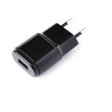 Black usb adapter charger isolated over the white backgroundの写真素材