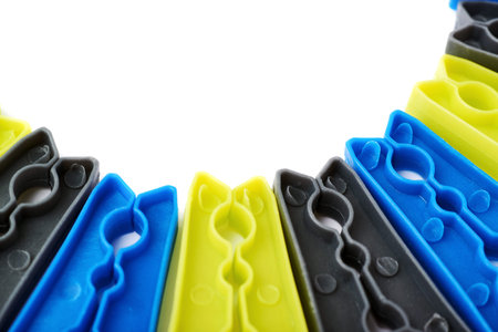 Semicirle shape of plastic cloth pegs isolated over white background
