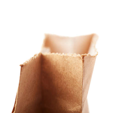 Craft brown paper pack for tea or coffee isolated over white backgroundの写真素材