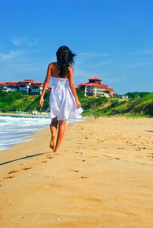 Fresh walk at the beachの写真素材