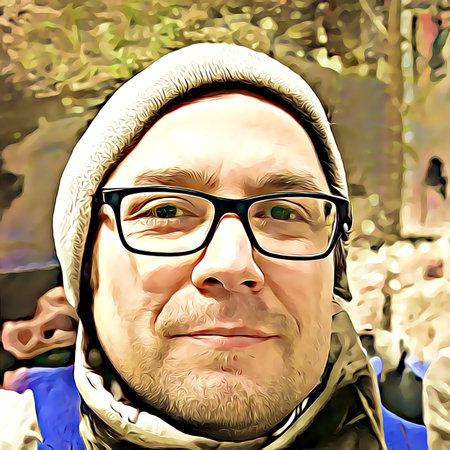 Cartoon-style portrait of person's face.