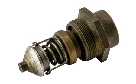 Antique vintage american automobile Antique vintage american automobile brass threaded style thermostat assembly on a white backgroundの写真素材