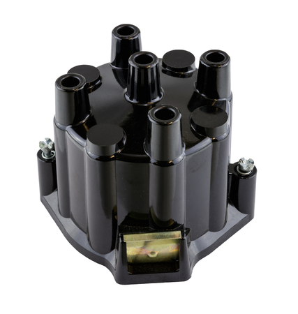 Antique vintage american automobile 4 cylinder ignition distributor cap on a white background.の写真素材