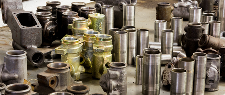 Vintage antique automotive machine shop stainless steel sleeved hydraulic cylinders and tubing assortmentの写真素材