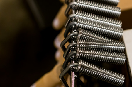 Wood handle aluminum heavy duty laminate roller tools in a rowの写真素材