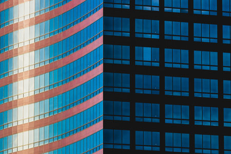 City glass skyscraper reflection of architecture in the sunlightの写真素材