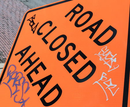 Abstract road closed ahead sign with graffitiの写真素材