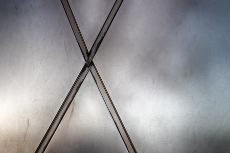 Steel metal repeating pattern texture of iron aluminum like materialsの写真素材