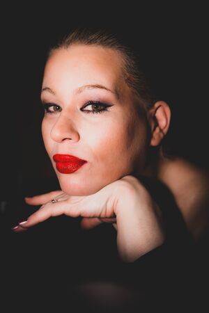 Classic timeless elegant model posing for vintage shoot in colorの写真素材