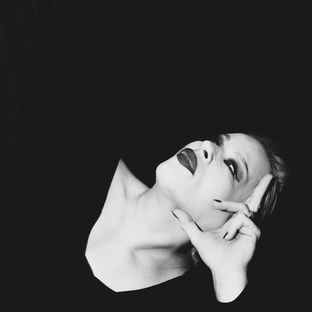 Classic timeless elegant model posing for vintage shoot in black and white