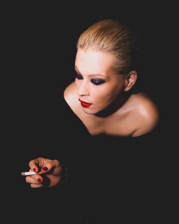 Classic timeless elegant model posing for vintage shoot in colorの写真素材