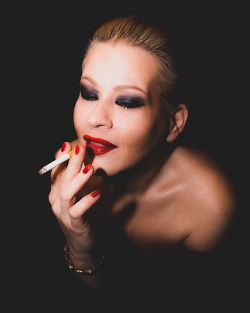 Classic timeless elegant model posing for vintage shoot in colorの写真素材