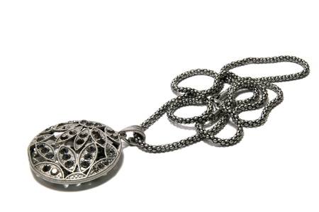 beautiful dark silver pendant with chain and gems の写真素材