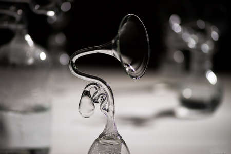 Magnetic resonance on whirpool water in glass black and white photoの写真素材