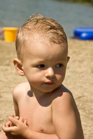 Rest after bath in cold water in lakeの写真素材