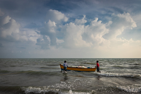 Isolated Fishermen boat in sea giving the details experience of a fishermen life. Image is taken at Dhanushkodi india.のeditorial素材