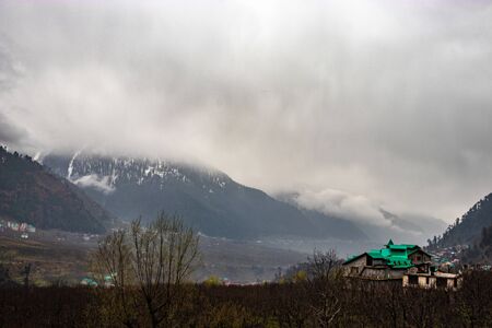 Snow at hills with tree and sky image is taken at manali india showing it amazing natural view.の写真素材