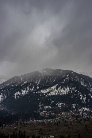 Snow at hills with tree and sky image is taken at manali india showing it amazing natural view.の写真素材