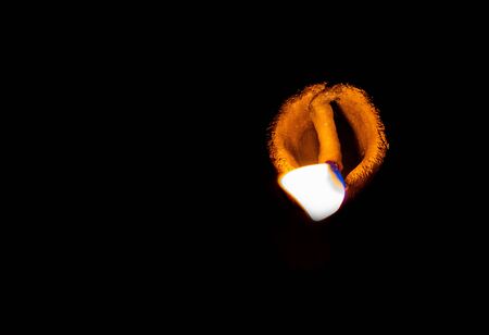 traditional religious soil made oil lamp isolated lightened for almighty godの写真素材
