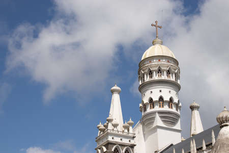 church dome antique stone bricks made in unique black and white color with bright blue sky image is taken at wayanad india.の写真素材
