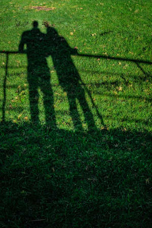 human shadow with amazing landscape backgroundの写真素材