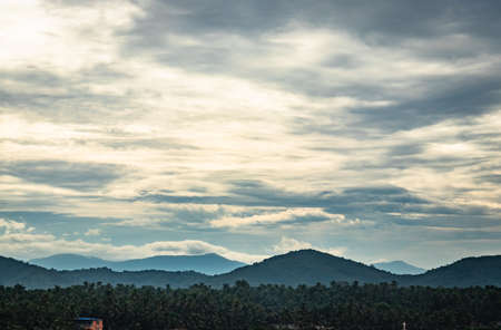 mountain shadow with bright sky at early in the morning from flat angle image is showing the beauty of nature.の写真素材