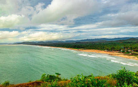 mountain top view of sea shore with clouded sky image is taken at gokarna karnataka india.の写真素材