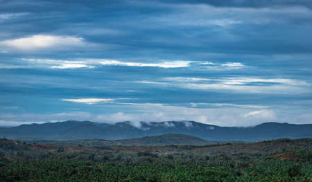 mountain top view of hill range with clouded sky image is taken at gokarna karnataka india.の写真素材